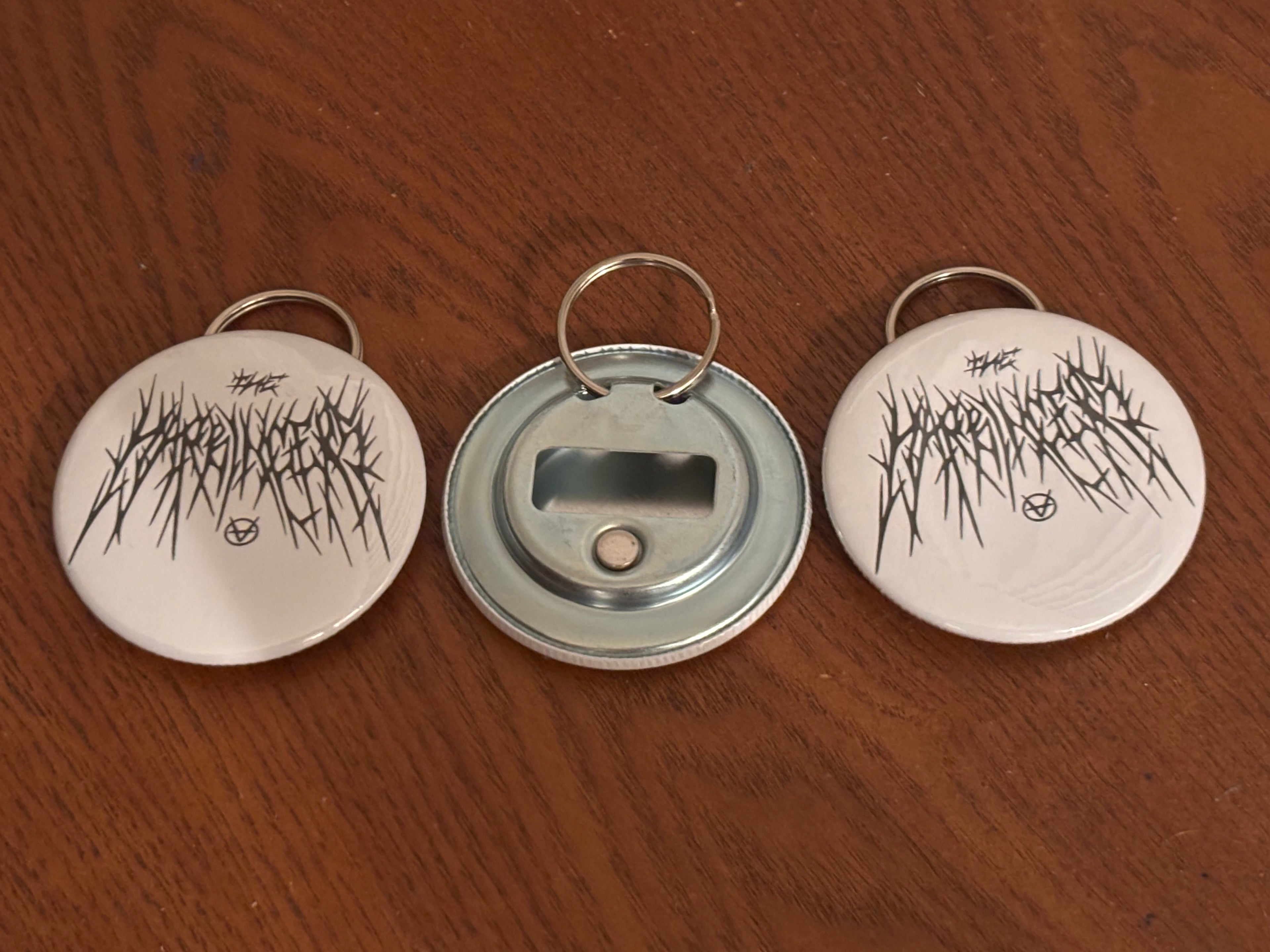 The Harbingers Bottle Opener Magnets